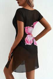 Back view of black cover-up dress with pink flower print