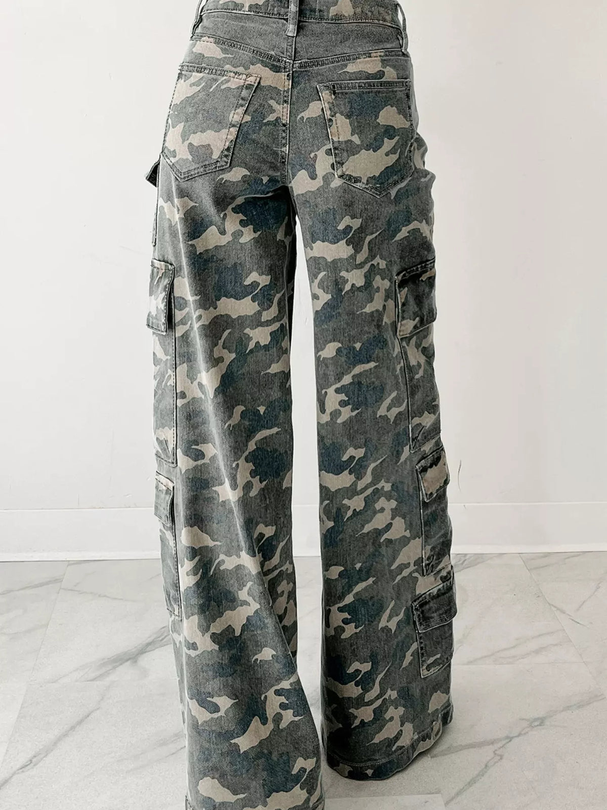 Gray camouflage-print wide-leg cargo jeans, front view