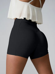 Side view of black active shorts showing the high-rise waistband.