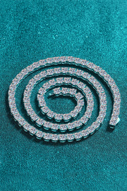 Rhodium-tone necklace with a line of bright stones arranged in a coil