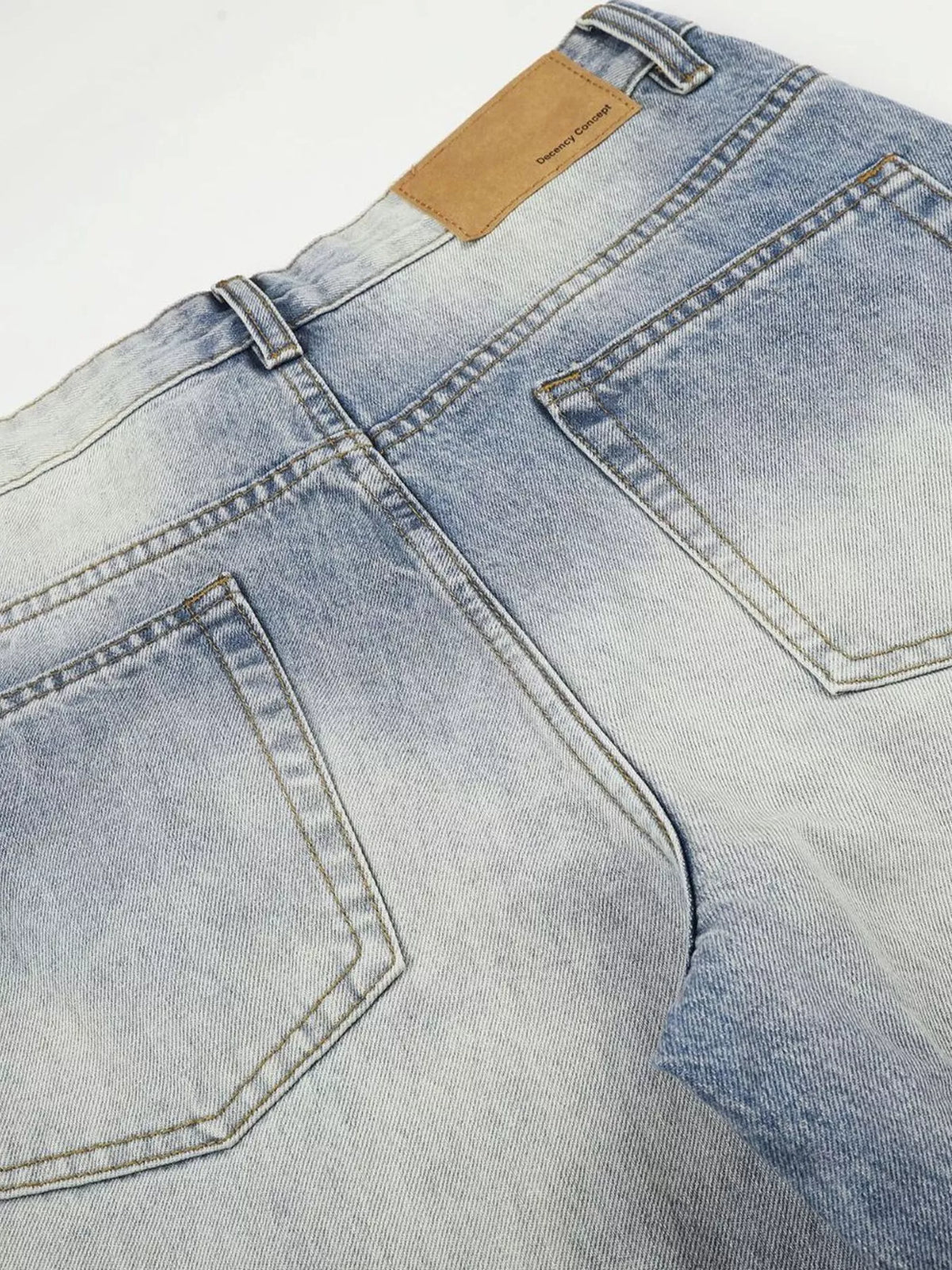 Close-up of rear waistband and patch pocket