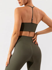 Back view of olive green active bra with adjustable center strap