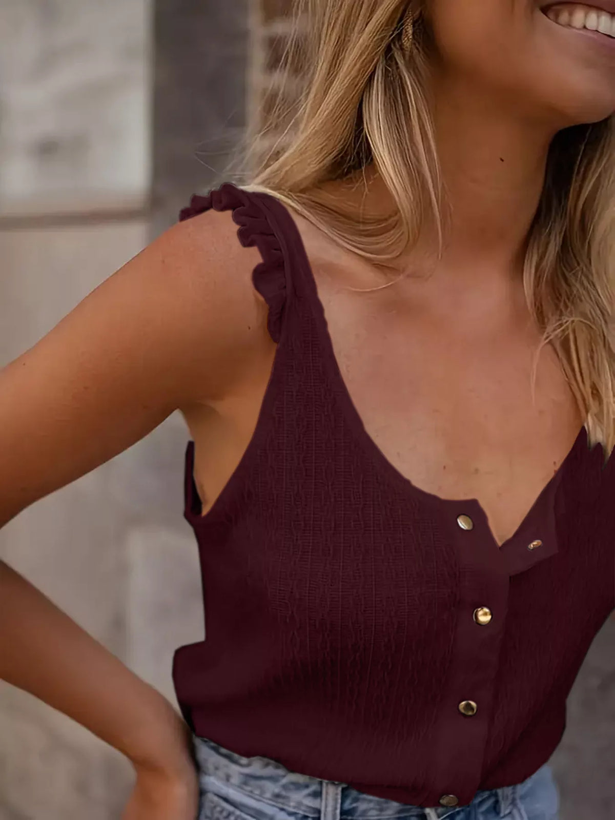 Burgundy tank neckline and buttons close-up