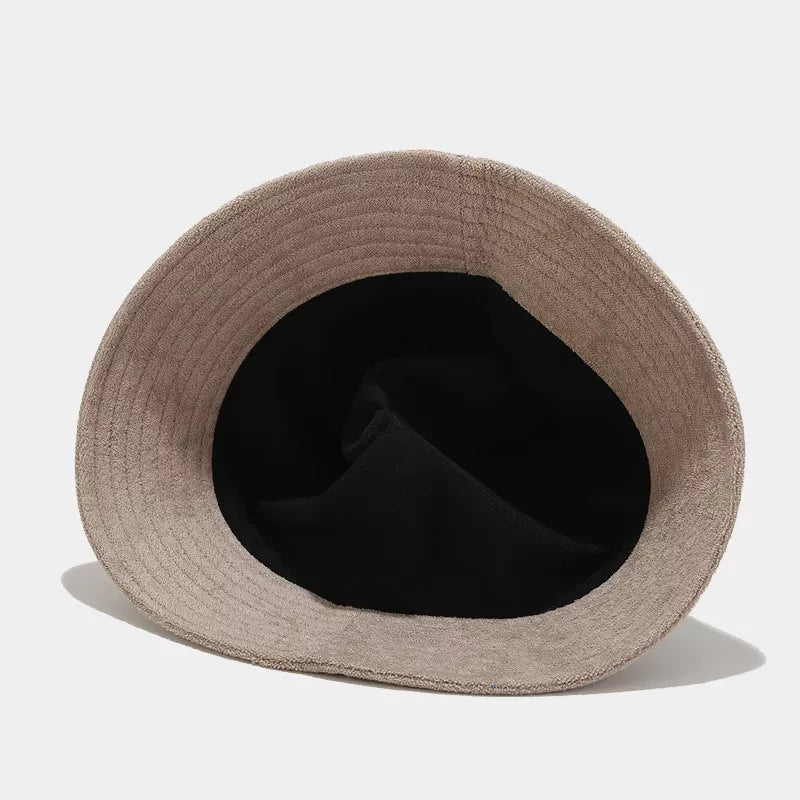 Pink wide-brim bucket hat shown from the front