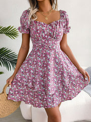 Front view of magenta floral mini dress with sweetheart neckline and flounce sleeves