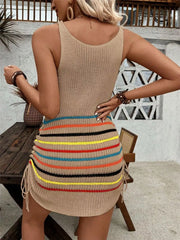 Model wearing khaki striped knit tank dress, showing the fitted sleeveless shape.