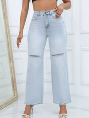 Front view of light-wash wide-leg jeans with distressed knees