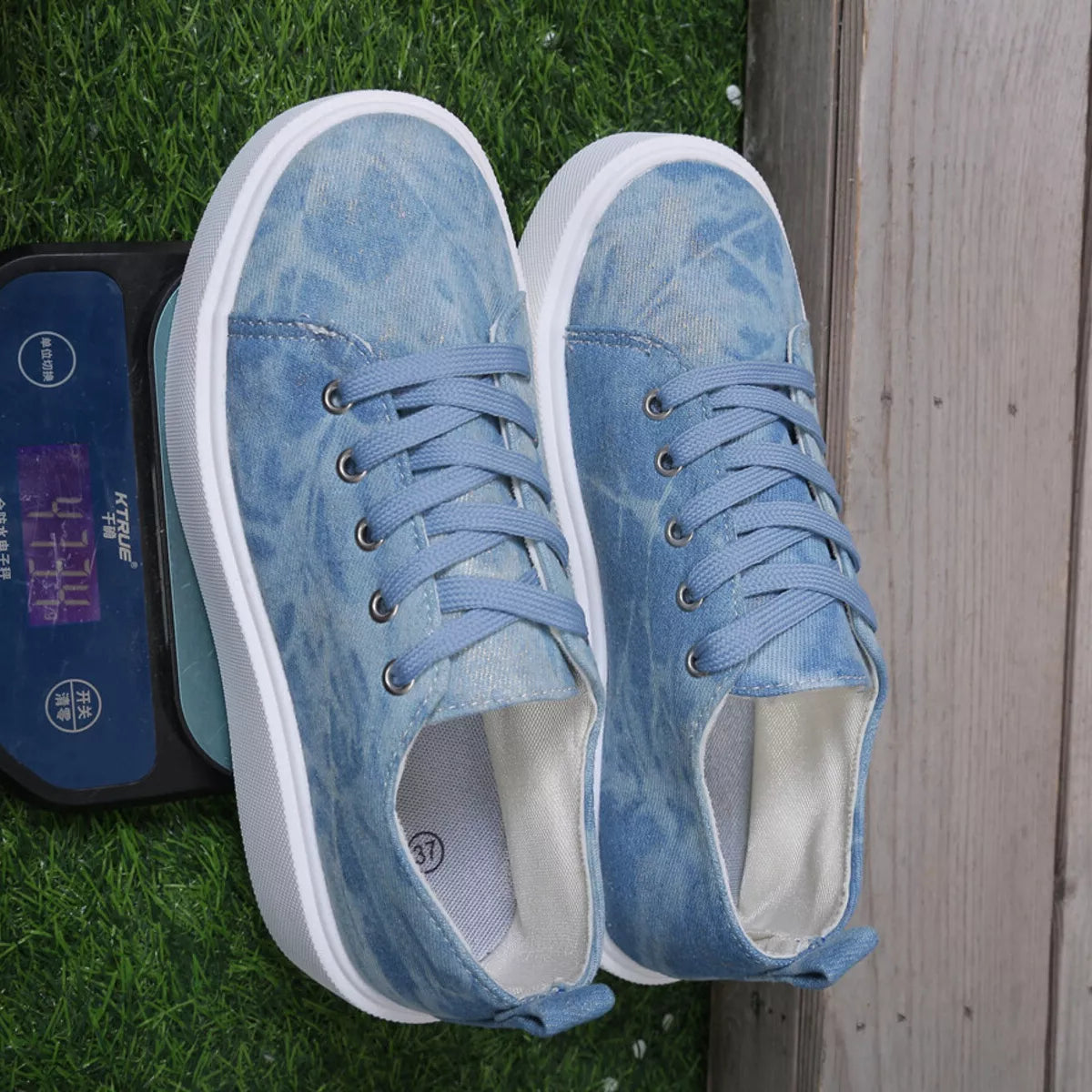 Top view of blue patterned lace-up sneakers